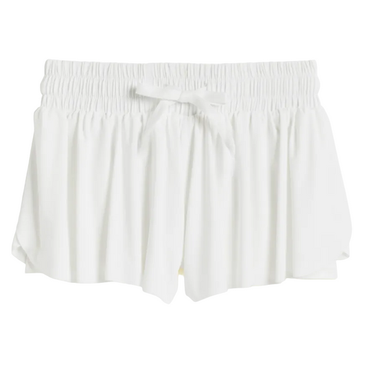 A pair of white shorts for girls, featuring a smocked waistband and a tie-bow detail.