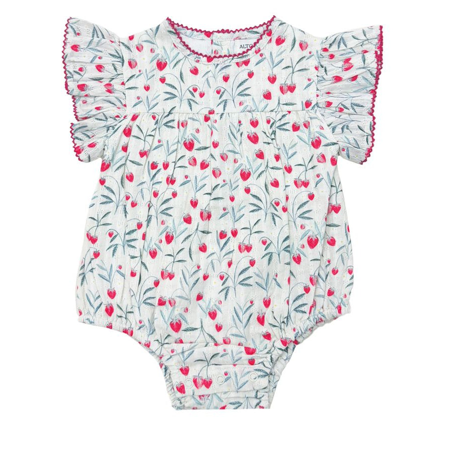 Baby romper with cherry pattern on a white background