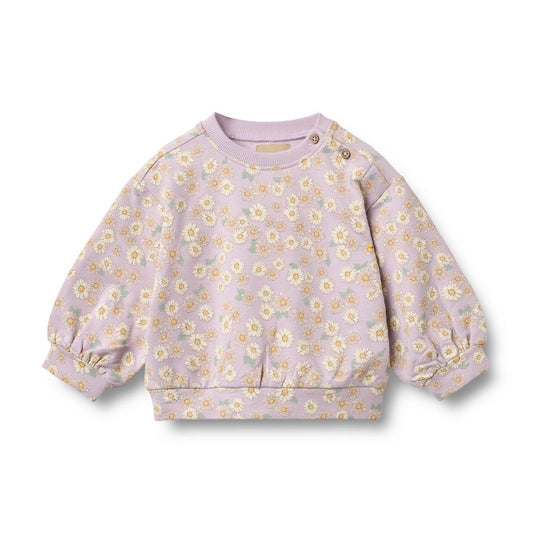Children's sweater with floral pattern on a white background