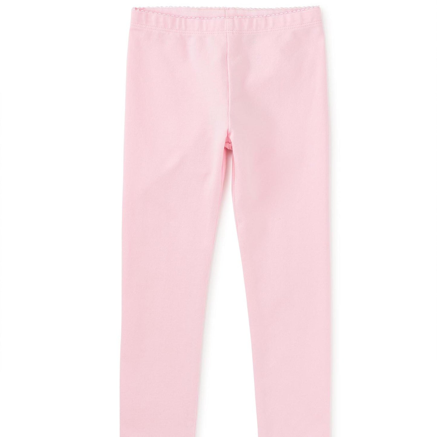 A pair of pink solid color leggings with an elastic waistband, fitted at the ankle, made from a cotton blend fabric.
