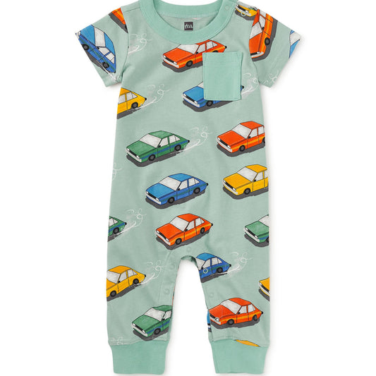 A short-sleeved baby romper with vintage car prints on a green background, featuring a chest patch pocket and snaps at the neck and inseam.