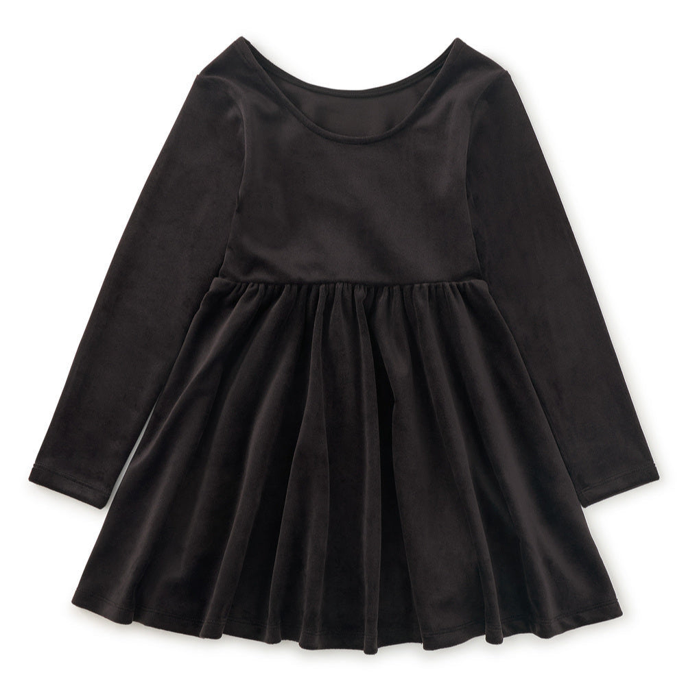 Black velour dress with long sleeves on a white background