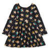 Black dress with colorful star pattern on a white background