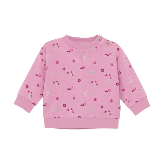 Pink children's sweatshirt with floral pattern on a white background