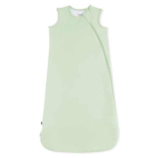 Light green baby sleeping bag on a white background