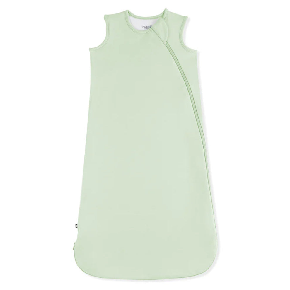 Light green baby sleeping bag on a white background