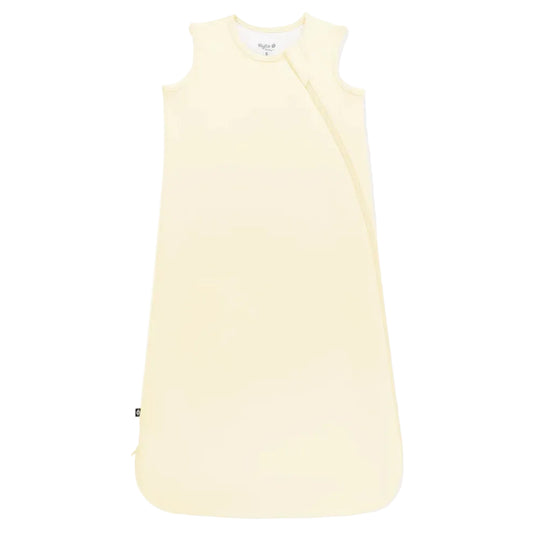Light yellow sleeveless dress on a white background