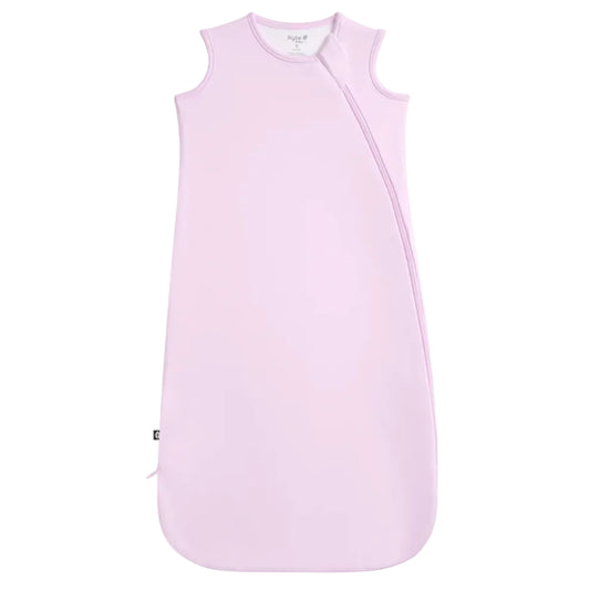 Pink baby sleeping bag on a white background