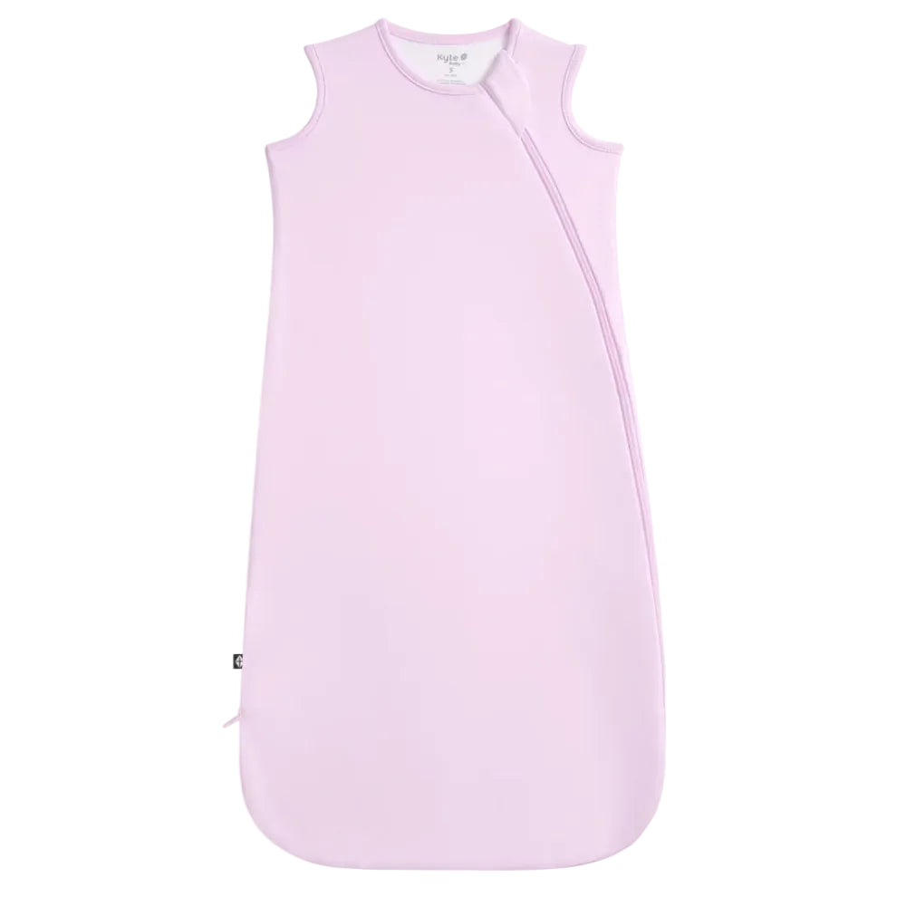 Pink baby sleeping bag on a white background