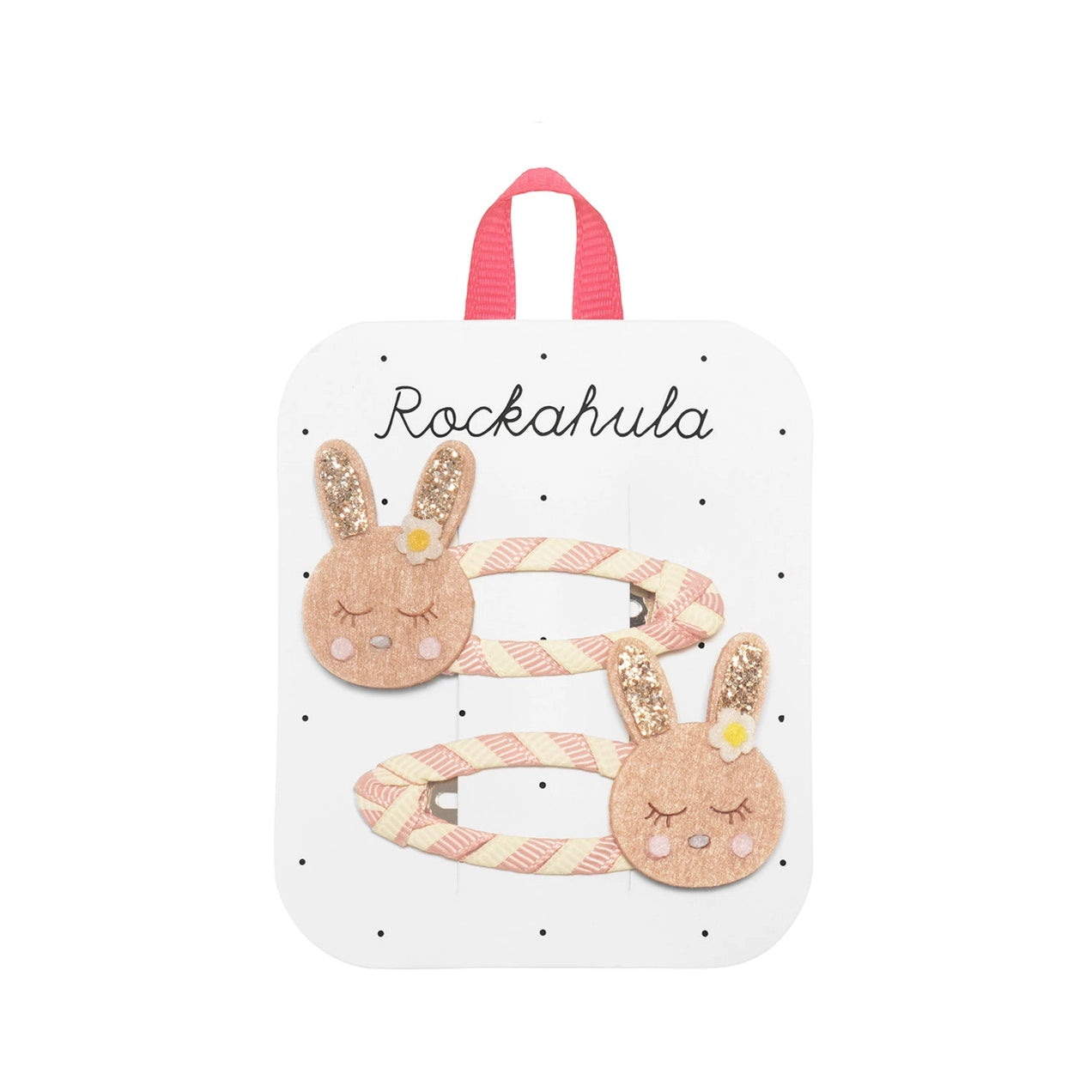 Two striped bunny-themed hair ties with pink and white colors and decorative ears on a white background with the Rockahula brand name.