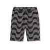 Knee-length boys' shorts with a geometric wave pattern in black and gray, featuring an elastic waistband with a functional drawcord, and patch pockets.