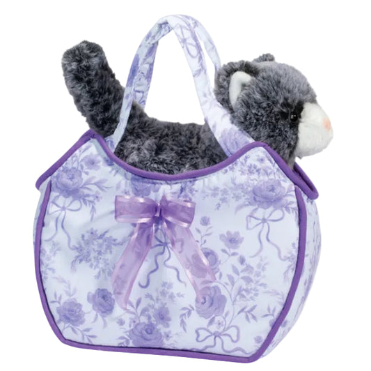 A plush toy bag with a floral pattern and a cat inside. The bag is primarily purple with a light purple border and a black cat with a grey bow detail.