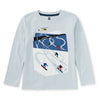 Light blue long-sleeve shirt with a graphic of skiers on a snowy slope.