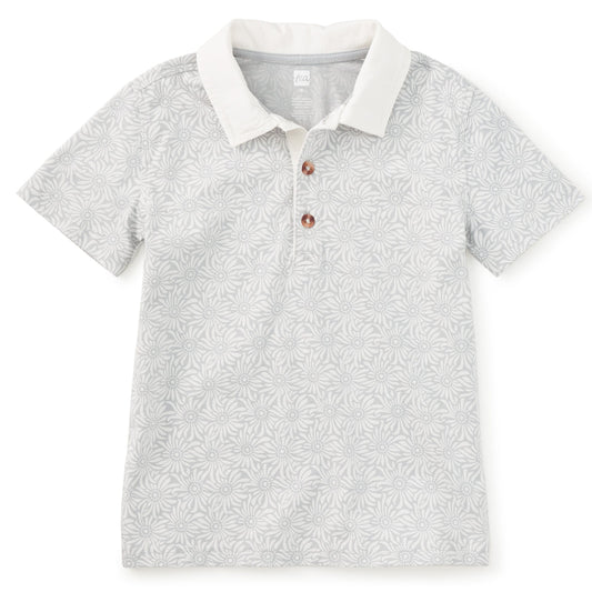Grey floral pattern polo on white background