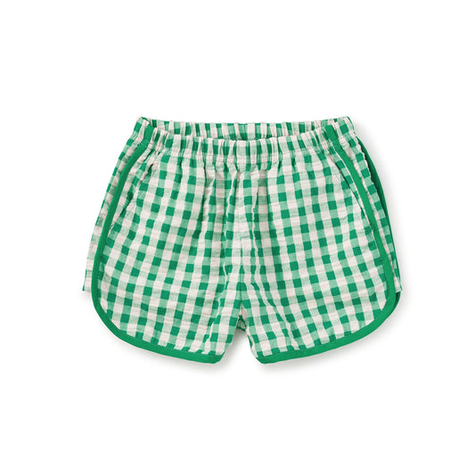 Green and white checkered shorts on a white background