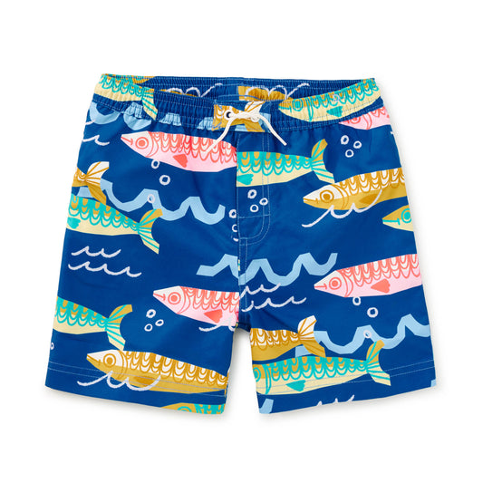 Children's swim shorts with fish pattern on a blue background
