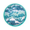 Round ceramic plate with wave pattern on a white background