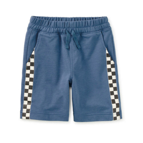 Blue shorts with checkered side panels on a white background