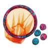 Colorful fishing net and colorful stones on a white background