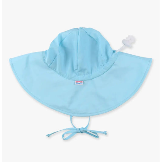 Light blue baby sun hat with a small tag on a white background