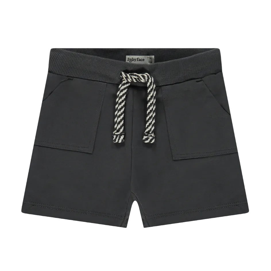 Black shorts with a rope tie on a white background