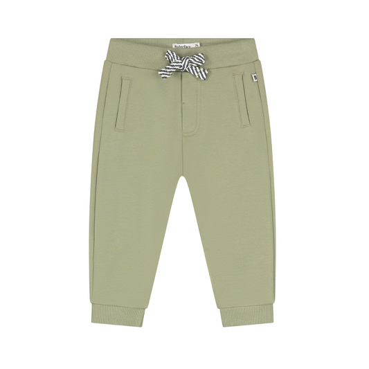 A pair of sage green children's jogger pants with a black and white striped drawstring, shown flat on a white background.