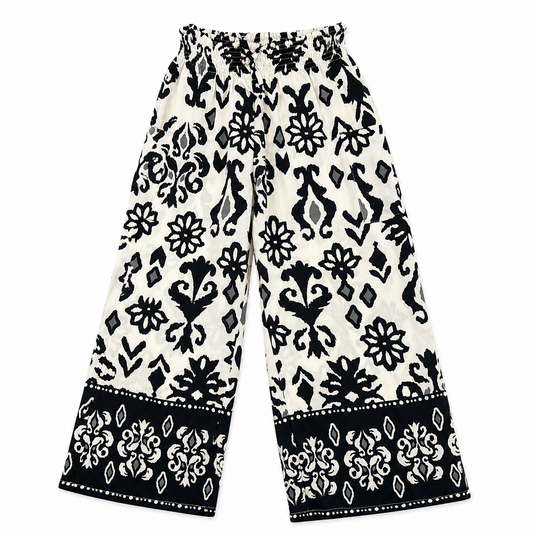Black and white patterned pants on a white background