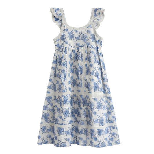 Long white dress with blue floral pattern and ruffled tank sleeves