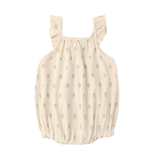 Beige baby romper with floral pattern