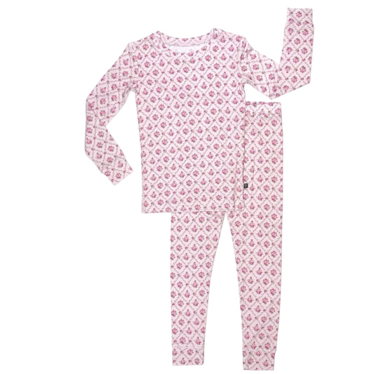 Pink floral pajama set on a white background