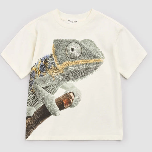 White t-shirt with a chameleon graphic on a light gray background