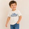 Child wearing a white t-shirt with 'Colorado' and mountain graphic.