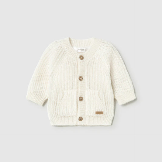 A cream-colored textured knit cardigan sweater with four brown buttons, shown flat on a white background.
