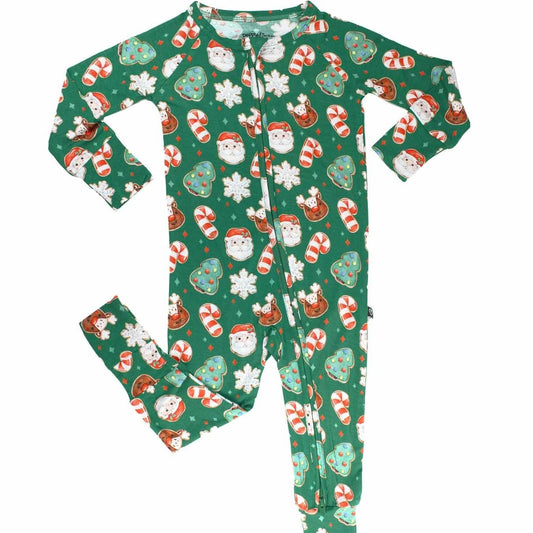 Christmas-themed onesie with Santa Claus, snowflakes, and candy cane pattern on a green background.