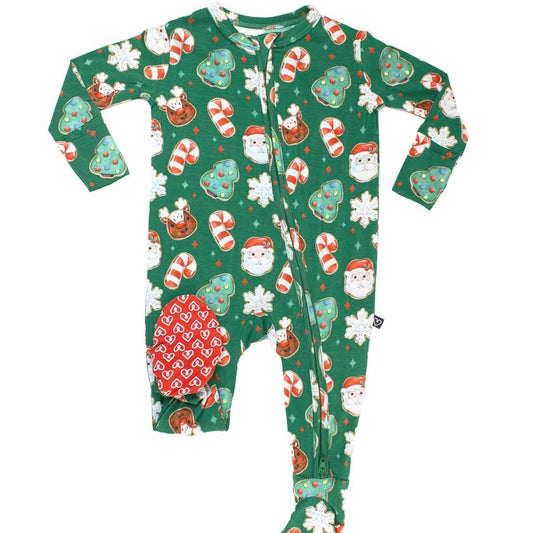 Christmas-themed baby onesie with Santa Claus, reindeer, and candy cane pattern on a green background.