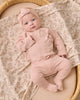 Baby wearing the Dusty Rose Headband by Quincy Mae