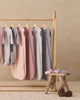 Baby wearing the Dusty Rose Knotted Hat (Bamboo), lifestyle photo