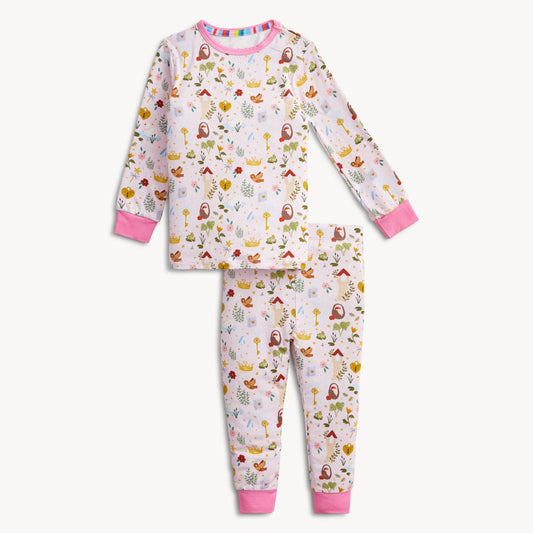 two piece pajamas with fairytale images on the fabric and pink trim
