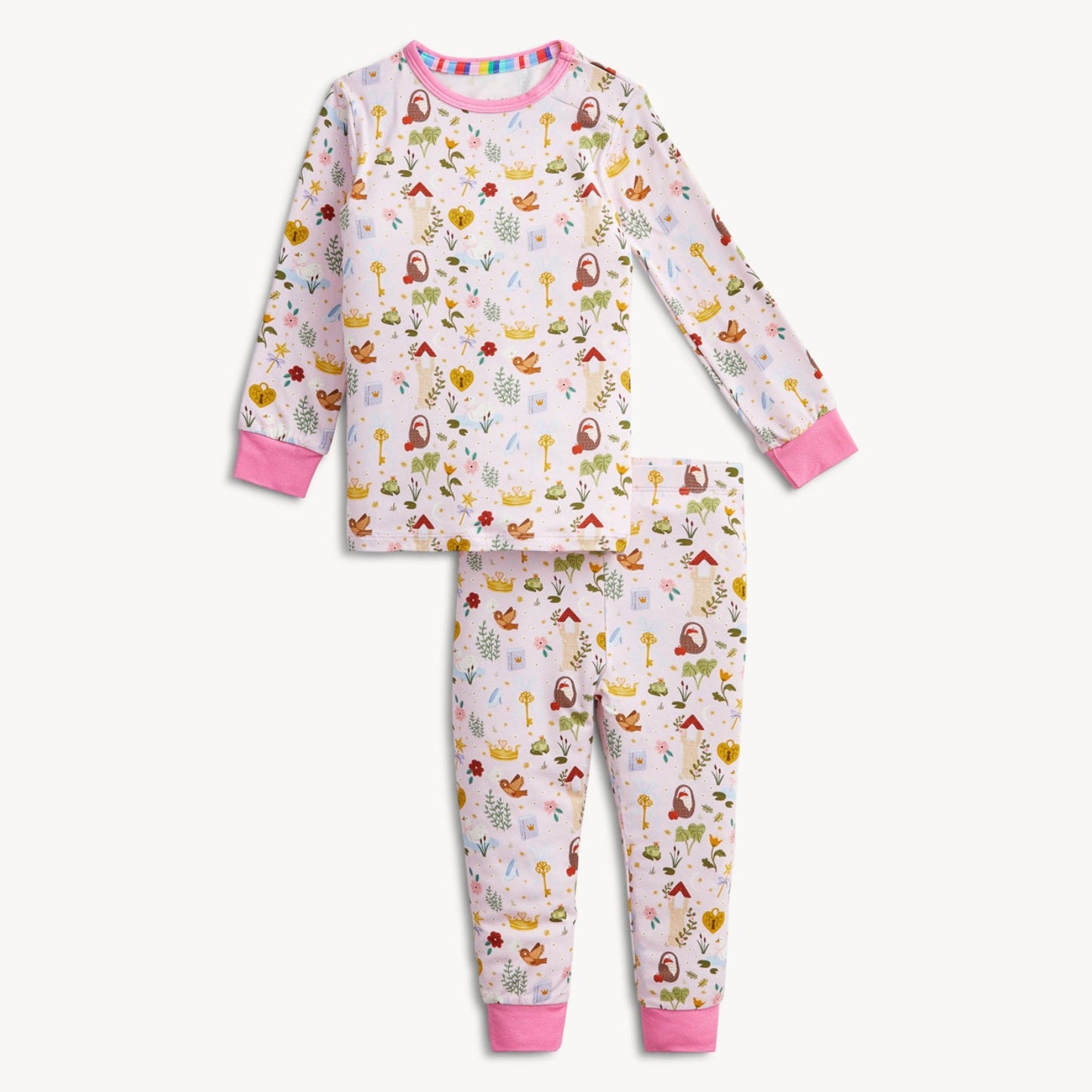 two piece pajamas with fairytale images on the fabric and pink trim
