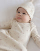 Baby wearing the Fall Ditsy Gown + Hat, lifestyle photo