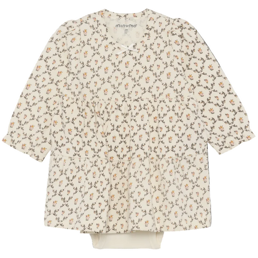 Floral patterned blouse on a white background