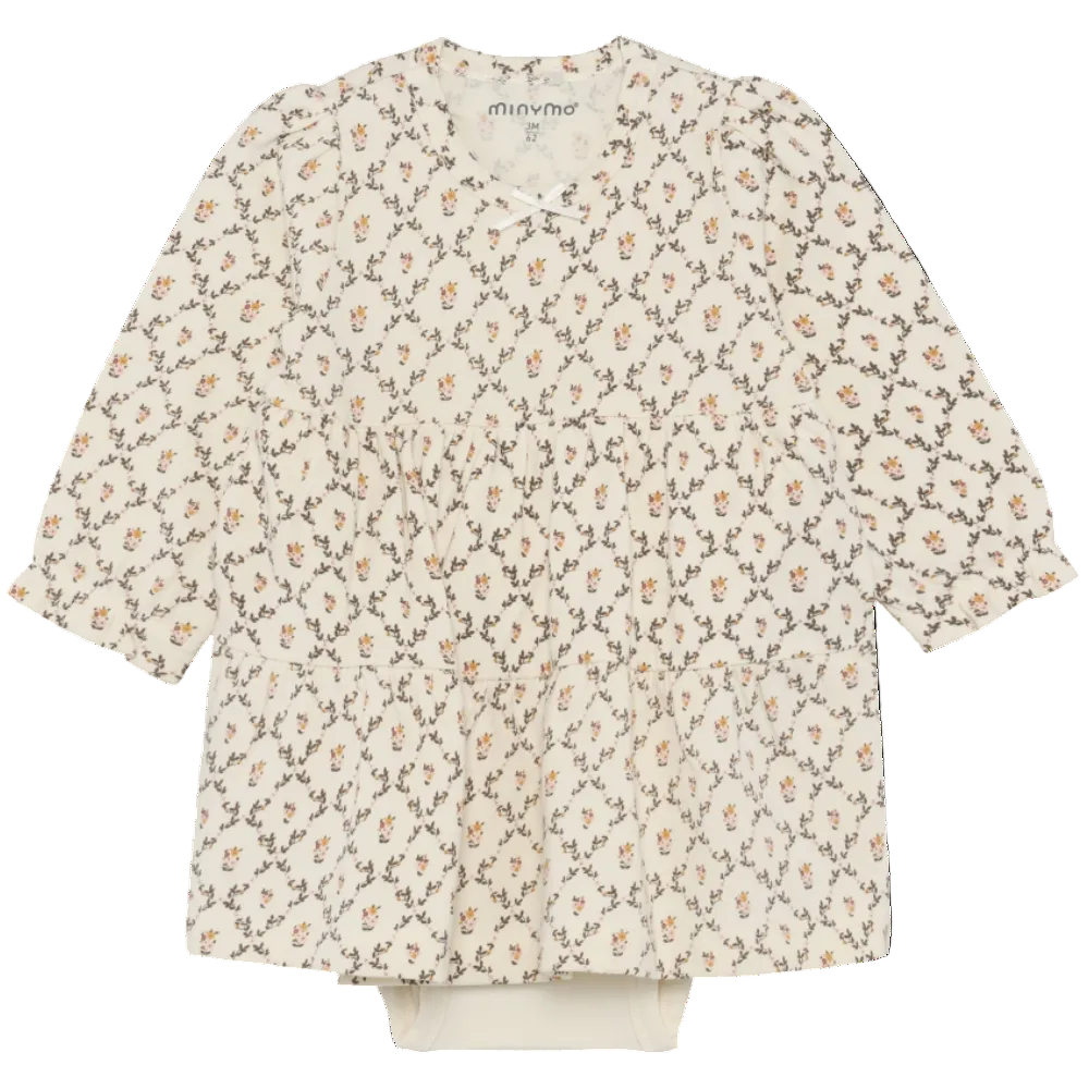 Floral patterned blouse on a white background
