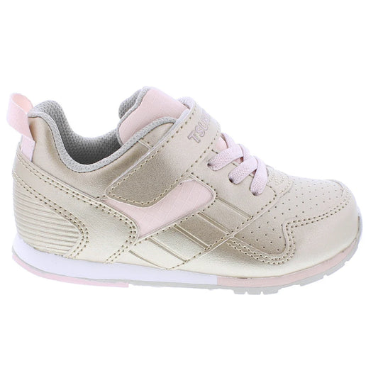 Gold and pink children's sneaker on a white background