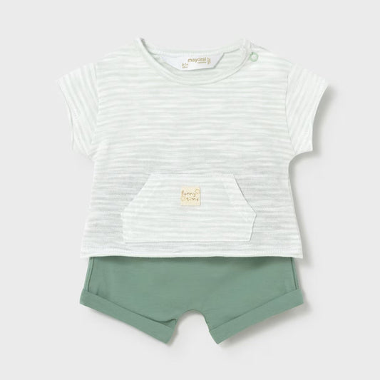 Striped baby top and green shorts set on a white background