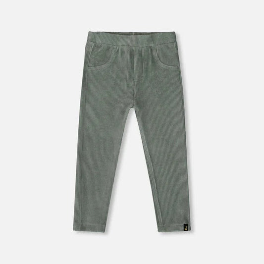 Green ribbed leggings on a light gray background
