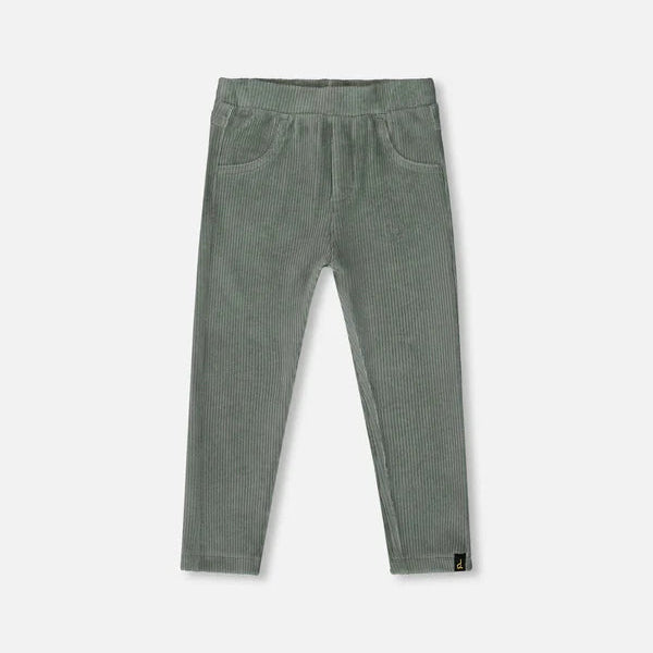 Green ribbed leggings on a light gray background