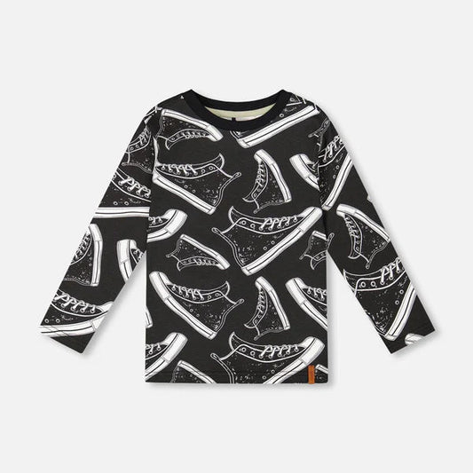 Black long-sleeve shirt with white shoe pattern on a white background