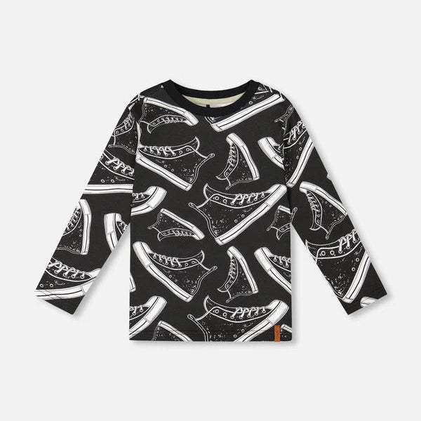Black long-sleeve shirt with white shoe pattern on a white background