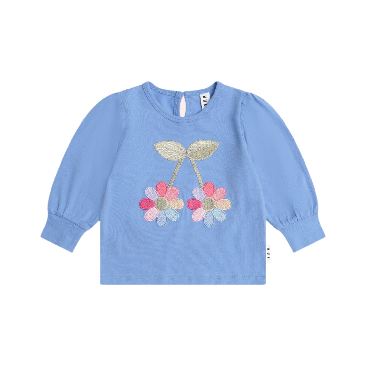 Blue long-sleeve shirt with floral design on a white background