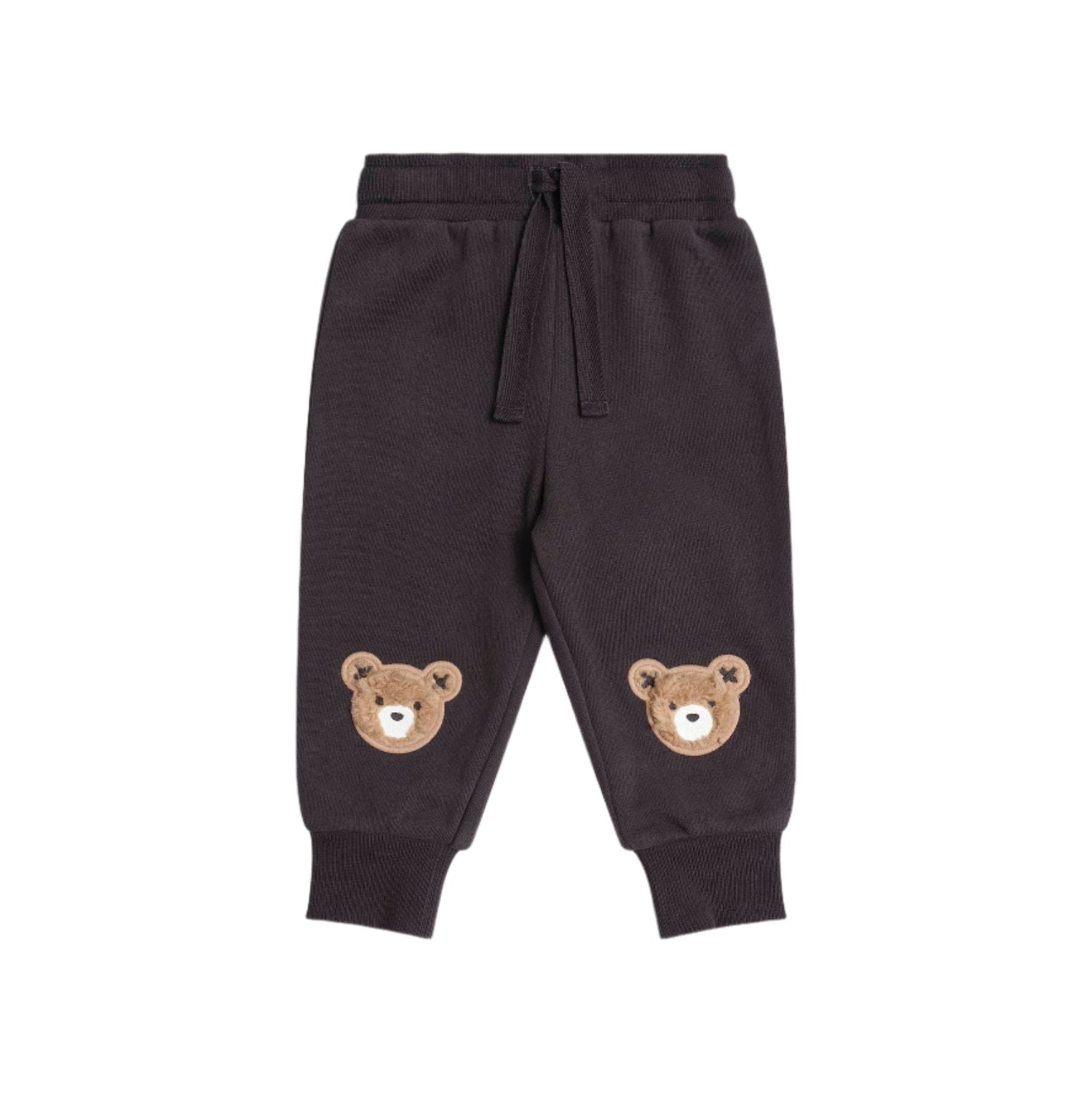 Dark gray sweatpants with bear face designs on a white background